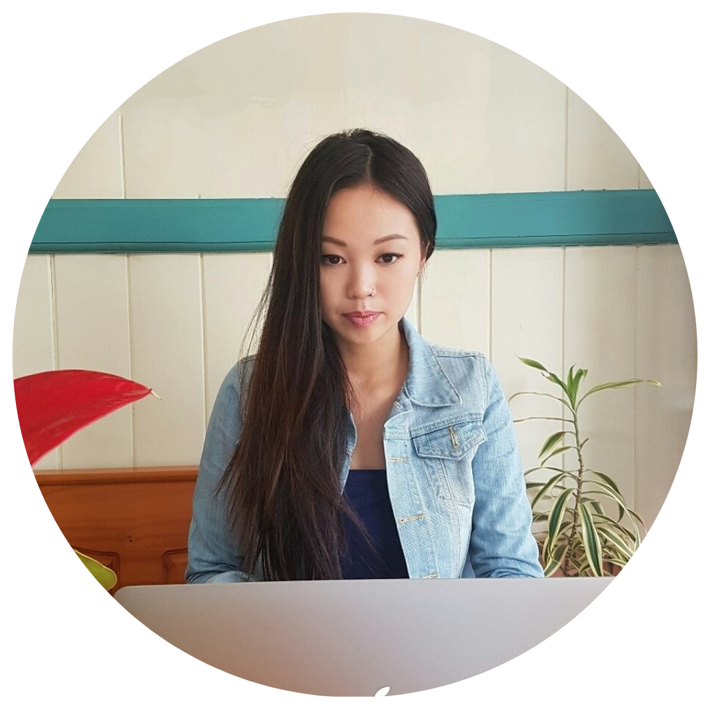 Contact 3 Jessie founder of She Works Remote Guide, working confidently in a well-lit workspace, representing remote work freedom and success.